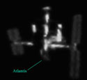 Spaceshuttle Atlantis aan het ISS aangemeerd.